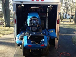 Riding Mower in Mobile Lawn Mower Repair Trailer - 2